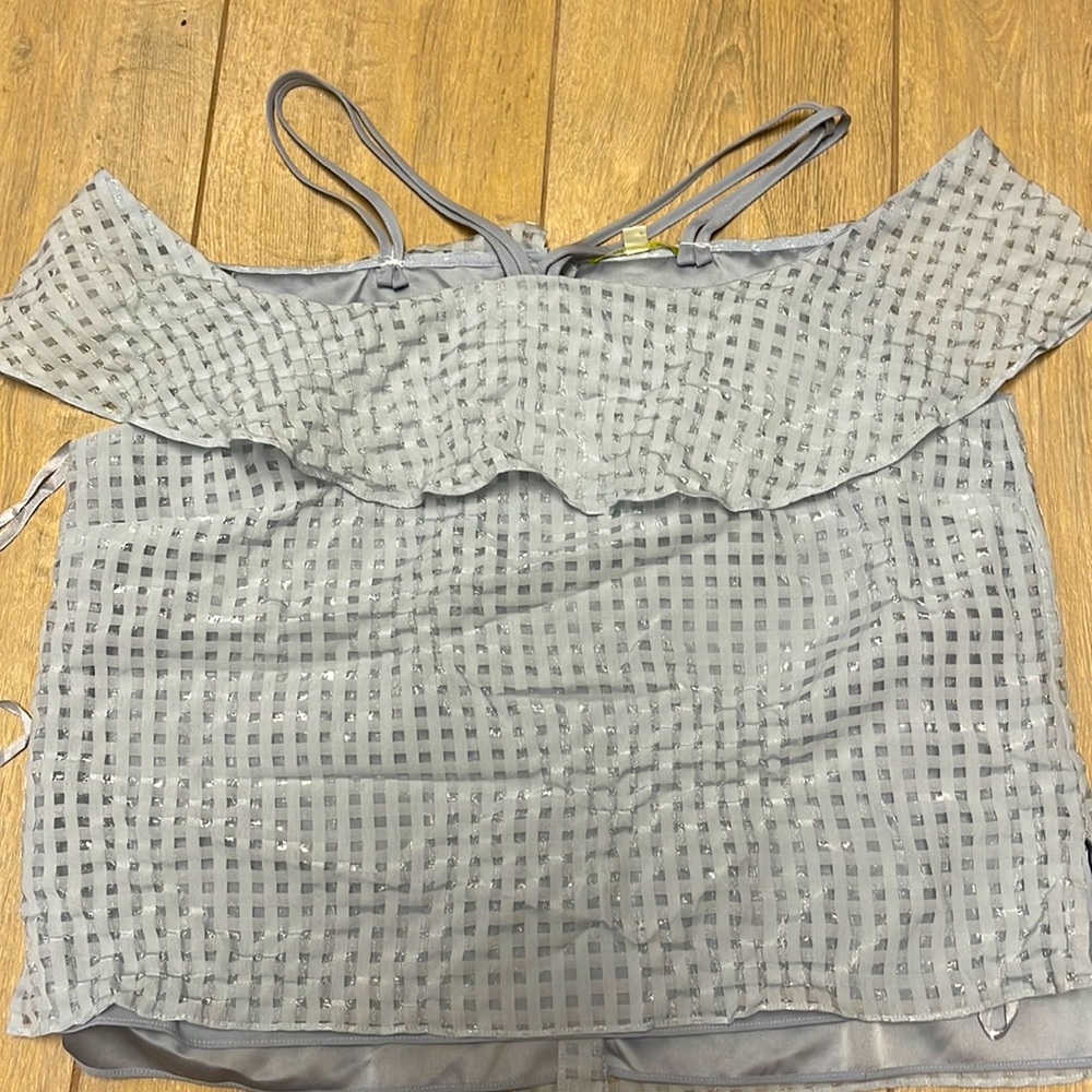 Woman’s blouse color light blue size L